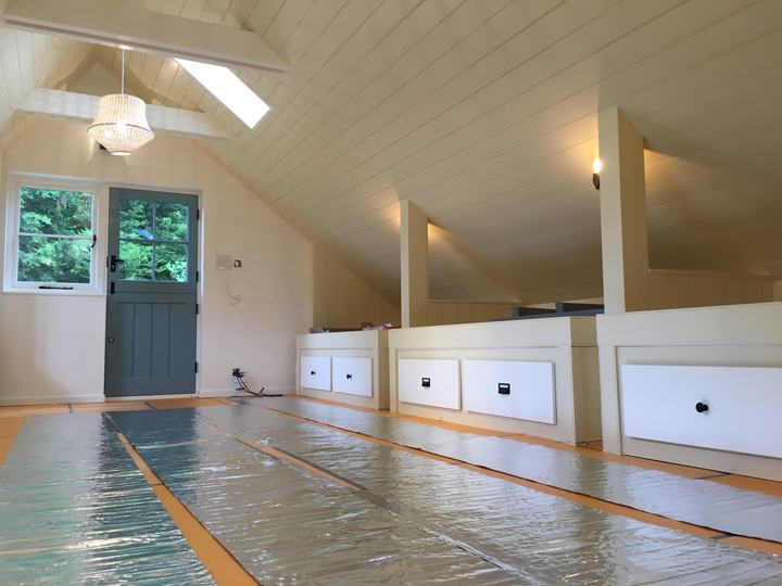 Loft room with built-in eaves storage drawers